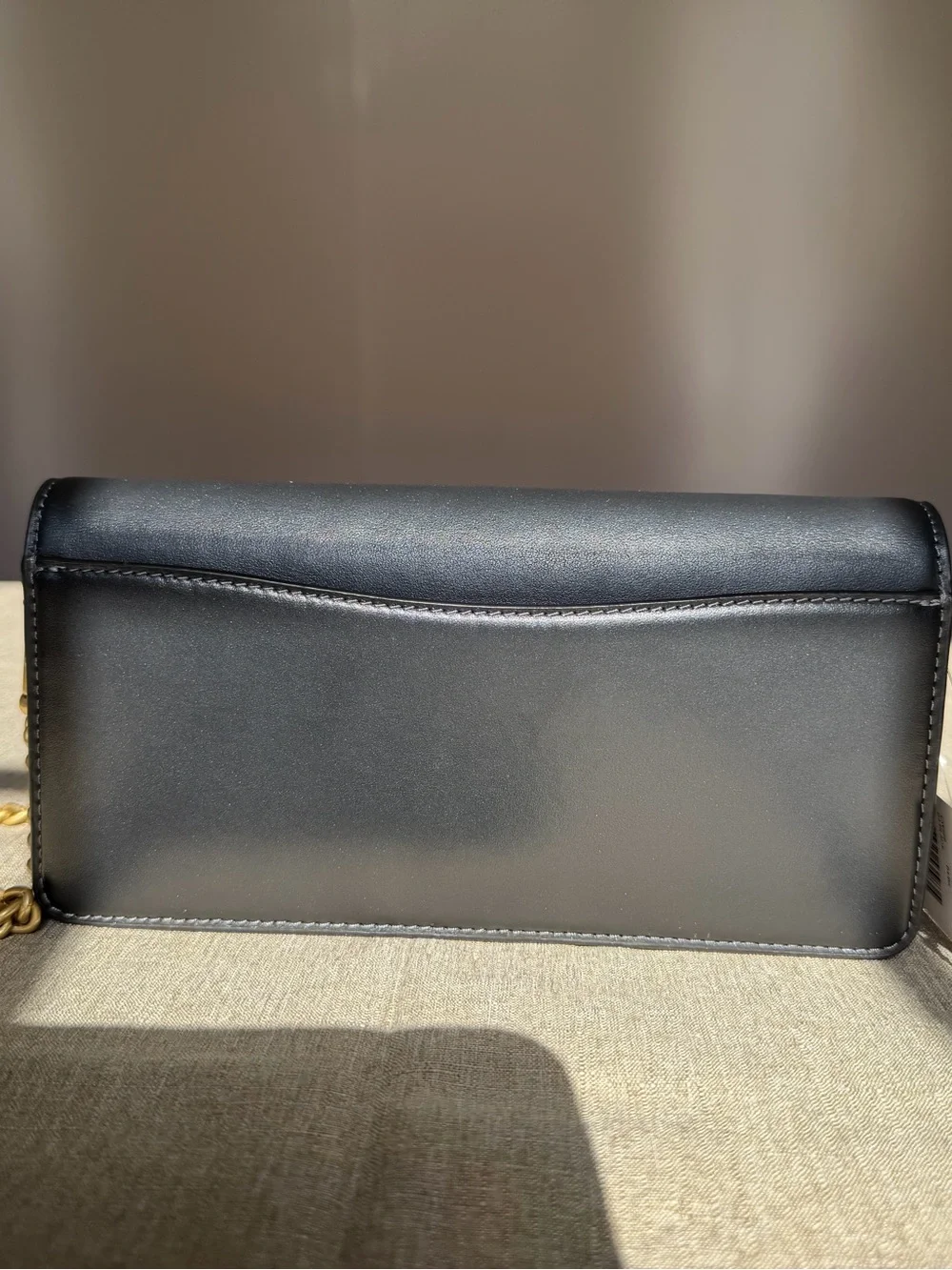 Coach sleek black